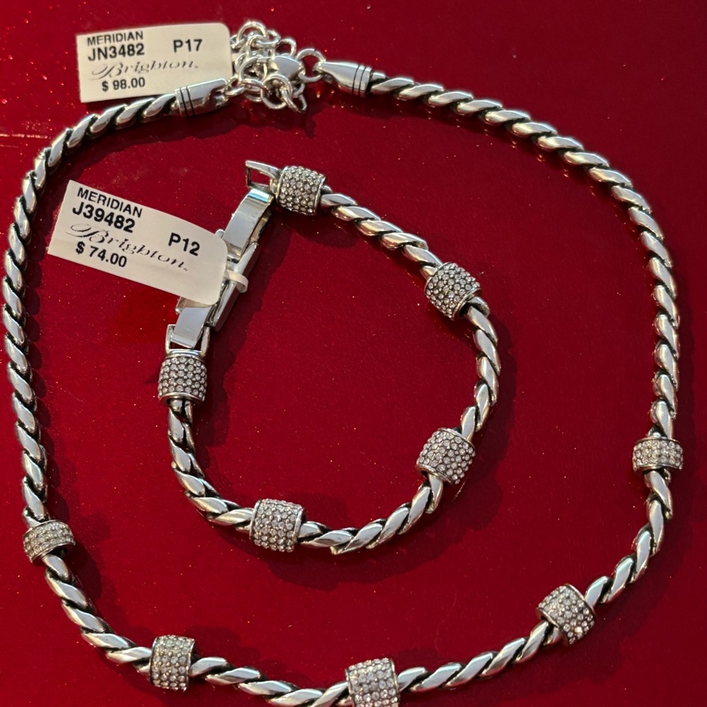 Brighton matching necklace & bracelet. Five circles of pavé cylinders on each.